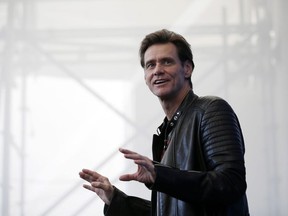 In this Sept. 5, 2017 file photo, actor Jim Carrey poses for photographers during the photo call of the film "Jim & Andy: The Great Beyond - The Story of Jim Carrey & Andy Kaufman Featuring a Very Special, Contractually Obligated Mention of Tony Clifton," at the 74th edition of the Venice Film Festival, in Venice, Italy. Carrey, said on Twitter on Tuesday, Feb. 6, 2018, that he's dumping his Facebook stock and deleting his page because the social media giant profited from Russian interference in the U.S. presidential election via spreading false news with Russian origins, and says they're still not doing enough to stop it. The 56-year-old Carrey encouraged other investors and users to do the same.