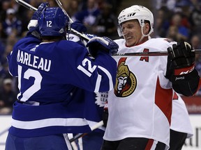 Toronto Maple Leafs Patrick Marleau LW (12) jousts with Ottawa Senators Dion Phaneuf D (2) during first period action in Toronto on Sunday February 11, 2018. Jack Boland/Toronto Sun/Postmedia Network