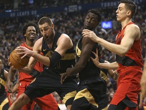 Toronto Raptors Jonas Valanciunas (17) gets a rebound during the first half against the Portland Trail Blazers at the Air Canada Centre in Toronto, Ont. on Saturday February 3, 2018. (Jack Boland/Toronto Sun)