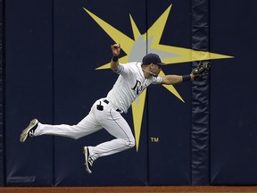 Tampa Bay Rays centre fielder Kevin Kiermaier makes a running catch during a game against the Blue Jays Thursday, Aug. 24, 2017, in St. Petersburg, Fla. (AP Photo/Chris O'Meara)