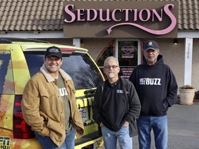 In this Feb. 2, 2018, photo, radio show hosts from left, David Bazzel, Roger Scott and Tommy Smith, pose outside a lingerie shop where they hosted their show in Little Rock, Ark. The three run an annual contest called the "Babe Bracket," which pits 16 local female television personalities in a tournament-like personality contest. Last year's runner-up says the contest ignores the women's professional accomplishments and she started a protest on Twitter on Thursday, Feb. 15, 2018.