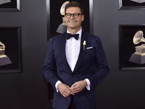 Ryan Seacrest arrives at the 60th annual Grammy Awards at Madison Square Garden on Sunday, Jan. 28, 2018, in New York.