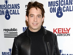 FILE - In this Nov. 18, 2014 file photo, Republic Records executive vice president Charlie Walk attends Musicians On Call 15th Anniversary at Espace in New York. Republic Records has put its president on leave after a former employee accused him of sexual harassment in an open letter posted on her website. Republic Records says it has hired an independent law firm to investigate the matter and encouraged any affected employees to meet with them.