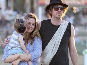 Actress Alicia Silverston has called it quits with her singer husband Christopher Jarecki  after a 20-year relationship.