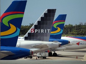 Spirit Airlines planes sit on the tarmac at the Fort Lauderdale International Airport in Fort Lauderdale, Fla., on June 14, 2010.