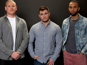 In this Jan. 27, 2018 photo, Spencer Stone, from left, Alek Skarlatos, and Anthony Sadler, pose for a portrait to promote the film "15:17 to Paris" at the Four Seasons Hotel in Los Angeles. The trio, who famously thwarted a potential terrorist attack in August 2015 on a Paris-bound train, play themselves in the film. (Photo by Rebecca Cabage/Invision/AP)