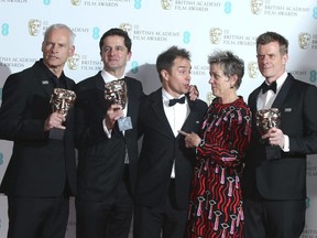 Director Martin McDonagh, from left, producer Peter Czernin, actors Sam Rockwell, Frances McDormand and producer Graham Broadbent pose for photographers backstage with their Best Film awards for 'Three Billboards Outside Ebbing, Missouri' at the BAFTA Awards in London, Sunday, Feb. 18, 2018.