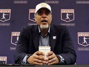In this Feb. 19, 2017, file photo, Tony Clark, executive director of the Major League Players Association, answers questions at a news conference in Phoenix. (AP Photo/Morry Gash, File)