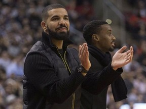 An appreciative Drake on the sidelines as the Toronto Raptors take on the Cleveland Cavaliers in Toronto, Ont. on January 11, 2018. Stan Behal/Toronto Sun/Postmedia Network