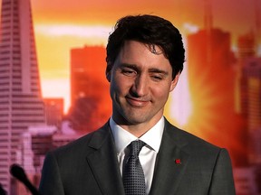 Prime Minister Justin Trudeau looks on before speaking to members of the media during a visit to AppDirect on Feb. 8, 2018 in San Francisco. (Justin Sullivan/Getty Images)