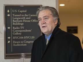 Steve Bannon, u.s. President Donald Trump's former chief strategist, arrives for questioning by the House Intelligence Committee as part of its ongoing investigation into meddling in the U.S. elections by Russia, at the Capitol in Washington, Thursday, Feb. 15, 2018. (AP Photo/J. Scott Applewhite)