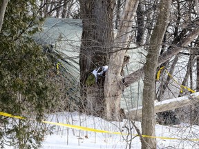 Police continue to investigate on Mallory Crescent on Tuesday February 6, 2018. A large tent is placed in the backyard,while a team digs for human remains of victims associated with alleged serial killer Bruce McArthur. Veronica Henri/Toronto Sun/Postmedia Network