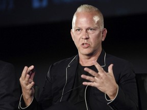 FILE - In this Aug. 9, 2017 file photo, Ryan Murphy, the executive producer/writer/director of "The Assassination of Gianni Versace: American Crime Story," takes part in a panel discussion on the FX series during the 2017 Television Critics Association Summer Press Tour in Los Angeles. Murphy is expanding his empire to Netflix. The streaming service says Murphy signed a deal to produce new series and films exclusively for it starting in July.