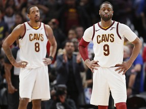 Cleveland Cavaliers guard Dwyane Wade (9) and forward Channing Frye (8) stand on the court late in the fourth quarter of a 125-114 loss to the Detroit Pistons in an NBA basketball game Tuesday, Jan. 30, 2018, in Detroit. (AP Photo/Duane Burleson)