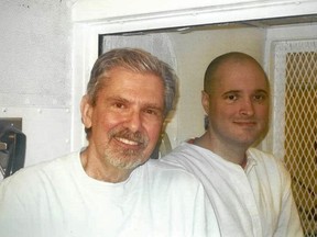 (FILES) File photo taken October 2016 shows Kent Whitaker (L) and his son Bart during a visit to Bart's prison in Polunsky, Texas.  (FAMILY HANDOUT/AFP/Getty Images)