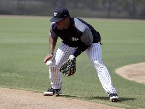 Seattle Seahawks NFL football team quarterback Russell Wilson does drills at New York Yankees baseball spring training camp, Monday, Feb. 26, 2018, in Tampa, Fla.