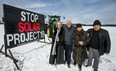 Farmer John Kordas (right) poses for a photo on his property with (from left) Caroline Thornton, Phil Carey and Jane Zednik, north of Port Hope in Campbellcroft. (ERNEST DOROSZUK, Toronto Sun)