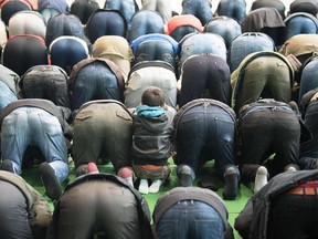 Muslims pray at a makeshift mosque in Potsdam near Berlin, northeastern Germany, on March 16, 2018.