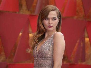 Zoey Deutch arrives at the Oscars on Sunday, March 4, 2018, at the Dolby Theatre in Los Angeles.