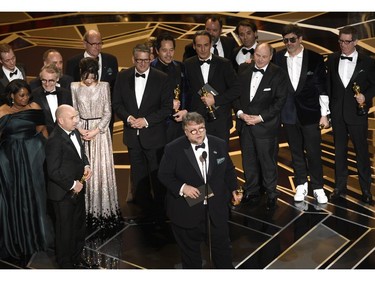 Guillermo del Toro and the cast and crew of "The Shape of Water" accept the award for best picture at the Oscars on Sunday, March 4, 2018, at the Dolby Theatre in Los Angeles.