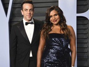B.J. Novak, left, and Mindy Kaling arrive at the Vanity Fair Oscar Party on Sunday, March 4, 2018, in Beverly Hills, Calif.