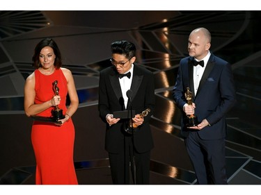 (L-R) Makeup artists Lucy Sibbick, Kazuhiro Tsuji and David Malinowski accept Best Makeup and Hairstyling for 'Darkest Hour' onstage during the 90th Annual Academy Awards at the Dolby Theatre at Hollywood & Highland Center on March 4, 2018 in Hollywood, California.