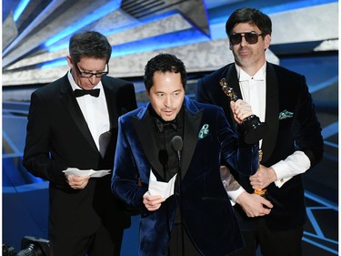 Production designers Jeff Melvin, Paul Denham Austerberry and Shane Vieau accept Best Production Design for 'The Shape of Water' onstage during the 90th Annual Academy Awards at the Dolby Theatre at Hollywood & Highland Center on March 4, 2018 in Hollywood, California.