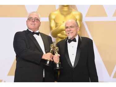 Sound editors Alex Gibson (L) and Richard King, winners of the Best Sound Editing award for 'Dunkirk,' pose in the press room during the 90th Annual Academy Awards at Hollywood & Highland Center on March 4, 2018 in Hollywood, California.