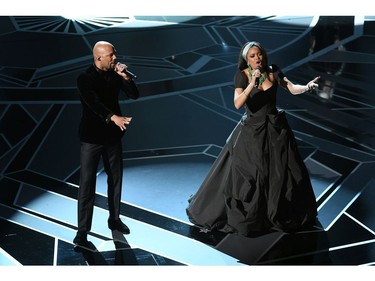 Musicians Common (L) and Andra Day perform onstage during the 90th Annual Academy Awards at the Dolby Theatre at Hollywood & Highland Center on March 4, 2018 in Hollywood, California.