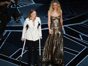 Actors Jodie Foster (L) and Jennifer Lawrence speak onstage during the 90th Annual Academy Awards at the Dolby Theatre at Hollywood & Highland Center on March 4, 2018 in Hollywood, California.