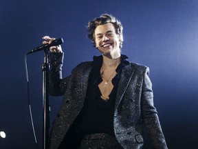 In this handout photo provided by Helene Marie Pambrun, Harry Styles performs during his European tour at AccorHotels Arena on March 13, 2018 in Paris, France.  (Photo by Handout/Helene Marie Pambrun via Getty Images)