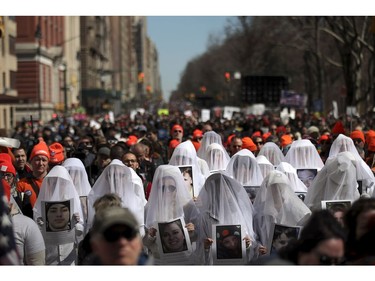 Protestors, including the group Gays Against Guns, attend the March For Our Lives just north of Columbus Circle, March 24, 2018 in New York City. Thousands of demonstrators, including students, teachers and parents are gathering in Washington, New York City and other cities across the country for an anti-gun violence rally organized by survivors of the Marjory Stoneman Douglas High School school shooting on February 14 that left 17 dead. More than 800 related events are taking place around the world to call for legislative action to address school safety and gun violence.