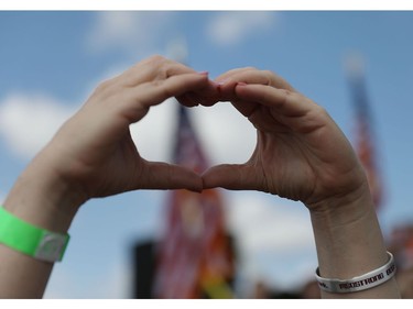 A heart is formed with hands as people participate in the March For Our Lives event at Pine Trails Park before walking to Marjory Stoneman Douglas High School on March 24, 2018 in Parkland, Florida. The event was one of many scheduled around the United States calling for gun control after a gunman killed 17 people on February 14 at the high school.