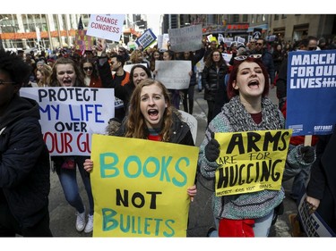 Protestors shout as they march down Sixth Avenue during the March For Our Lives, March 24, 2018 in New York City. Thousands of demonstrators, including students, teachers and parents are gathering in Washington, New York City and other cities across the country for an anti-gun violence rally organized by survivors of the Marjory Stoneman Douglas High School school shooting on February 14 that left 17 dead. More than 800 related events are taking place around the world to call for legislative action to address school safety and gun violence.