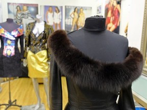 This photo taken Thursday, March 15, 2018, shows West Coast Leather's vintage fox trimmed leather dress by North Beach Leather, displayed in the basement of West Coast Leather in San Francisco.