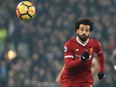 Liverpool's Egyptian midfielder Mohamed Salah chases the ball during the English Premier League football match between Liverpool and Newcastle at Anfield in Liverpool, north west England on March 3, 2018.
