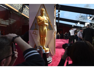 Photographers and TV crews get ready on the red carpet a few hours before the "Oscars", the 90th Annual Academy Awards on March 4, 2018, in Hollywood, California.