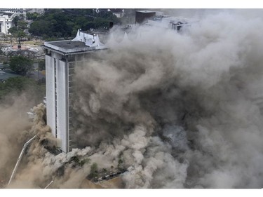 Heavy smoke engulfs the Waterfront Manila Pavilion building, after a fire broke out at the hotel and casino complex in Manila on March 18, 2018. (TED ALJIBE/AFP/Getty Images)
