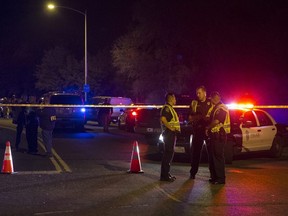 Authorities work the scene of an explosion in Austin, Texas, Sunday, March 18, 2018.