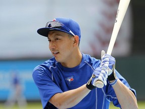 In this May 31, 2015, photo, then Toronto Blue Jays shortstop Munenori Kawasaki waits to bat before a game against the Minnesota Twins in Minneapolis.