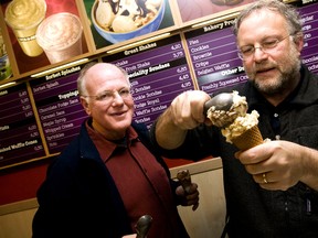 American ice cream makers Ben Cohen (L) en Jerry Greenfield, founders of the brand, Ben & Jerry's give out ice creams for free in their shop in the centre of Amsterdam, The Netherlands on Monday February 22, 2010.  (ADE JOHNSON/AFP/Getty Images)