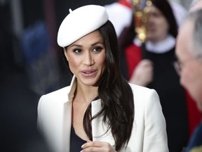 Britain's Prince Harry's fiancee Meghan Markle leaves the Commonwealth Service at Westminster Abbey, London Monday March 12, 2018.