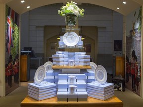 The new official range of china to celebrate the future marriage of Britain's Prince Harry and Meghan Markle is displayed in The Queen's Gallery shop at Buckingham Palace, London, Wednesday March 21, 2018.