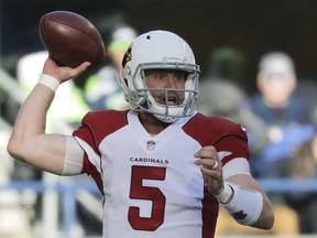 This Dec. 31, 2017 photo shows Arizona Cardinals quarterback Drew Stanton passes against the Seattle Seahawks in the first half of an NFL football game in Seattle. (AP Photo/Elaine Thompson)