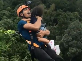 Malaysian man Redha Rozlan is facing online backlash after a video posted online shows him bungee jumping with his two-year-old daughter. (Instagram)