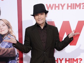 In this Dec. 17, 2016, file photo, Corey Feldman attends the world Premiere of "Why Him?" in Los Angeles. Los Angeles police are investigating an attack on actor Feldman. Officer Drake Madison says Feldman was stopped at an intersection with a passenger in his vehicle when an unknown male made a stabbing motion at the actor’s stomach around 10:45 p.m. Tuesday, March 27, 2018. Police say Feldman drove himself to a hospital, where he’s in stable condition. (Photo by Richard Shotwell/Invision/AP, File)