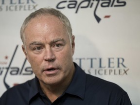 FILE - In this Sept. 23, 2016, file photo, Washington Capitals' general manager Brian MacLellan speaks to reporters during the first day of NHL hockey training camp, in Arlington, Va. The  Capitals have re-signed general manager Brian MacLellan to a contract extension. MacLellan is in the fourth year of his original four-year deal when he was promoted from assistant GM to replace McPhee. The team confirmed the extension Friday, March 9, 2018, in the midst of its California road trip.