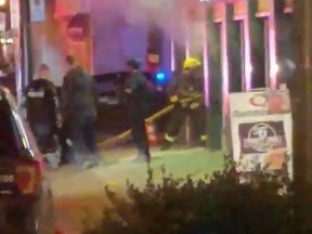 In this screenshot, fire crews respond to a McDonald's after police say a man carrying a gas can lit himself on fire in Vancouver on Mar. 15, 2018.