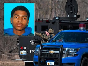 Law enforcement officers search a wooded area for James Eric Davis, Jr. (inset), a suspect involved in a shooting at a Central Michigan University residence hall on Friday, March 2, 2018 in Mt. Pleasant, Mich.  (Matthew Dae Smith/Lansing State Journal via AP/AFP PHOTO /CITY OF MT. PLEASANT/HANDOUT)