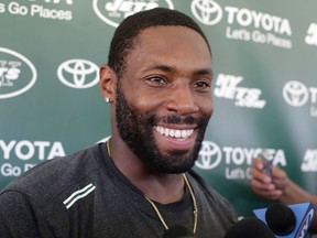 In this Aug. 4, 2015, file photo, New York Jets defensive back Antonio Cromartie responds to questions during a news conference after practice at NFL football training camp, in Florham Park, N.J.